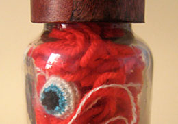 Jar of yarn eyeballs and blood