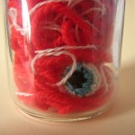 Jar of Crocheted Eyeballs in Blood Yarn