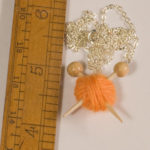 Orange Knitting Necklace Knitting Needles and Yarn Ball necklace