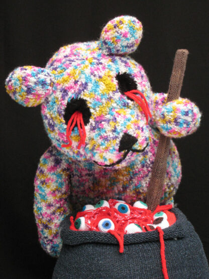 knitted teddy bear with no eyes
