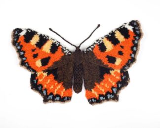 Knitted orange and brown butterfly