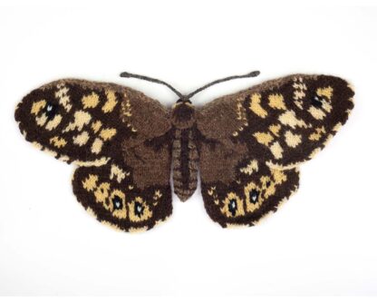 Knitted brown and bei.ge butterfly